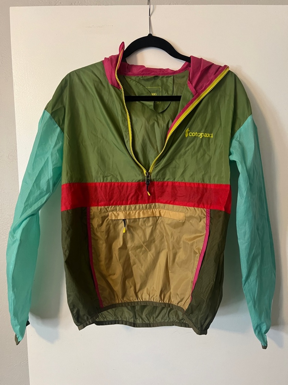 cotopaxi Olive Green Windbreaker with Teal Sleeves & Red Accent